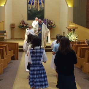 Students present Father with the Offertory Gifts