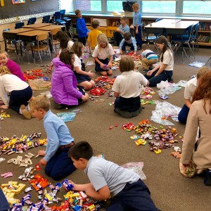 Counting and packaging candy as part of our Share the Joy project.