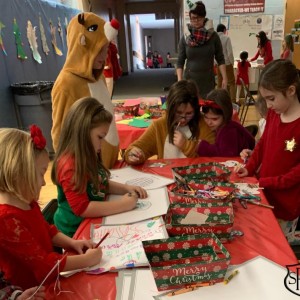 Older students helped with the PreK & K Breakfast with Santa.