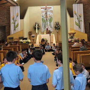 Each grade did one decade of the rosary. Here are the 3rd grades doing their decade.